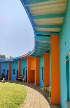 Childrens bedrooms overlooking open air central area in Rainbow Childrens Village