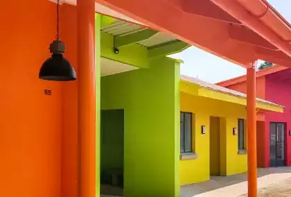 Brightly coloured canteen and administration block in Rainbow childrens home